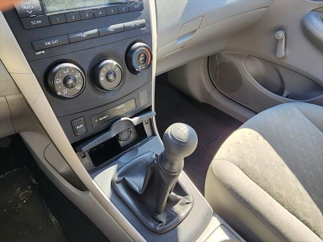 used 2009 Toyota Corolla car, priced at $10,000