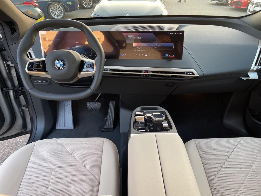 new 2026 BMW iX car, priced at $95,670