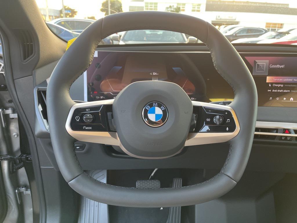new 2026 BMW iX car, priced at $95,670