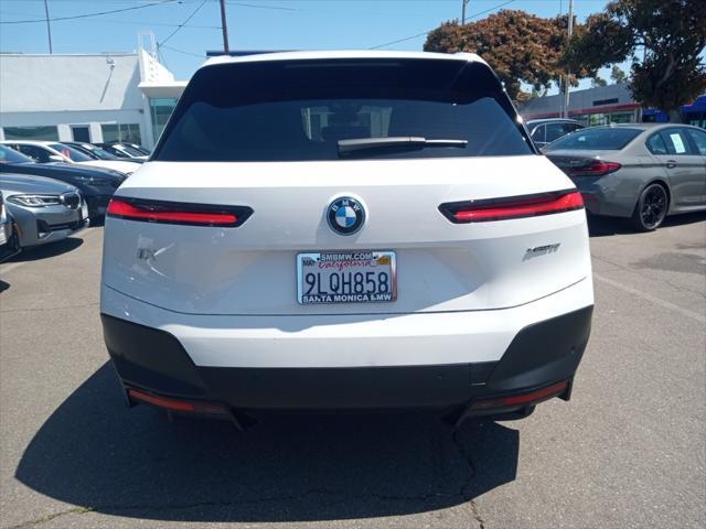 used 2025 BMW iX car, priced at $70,888