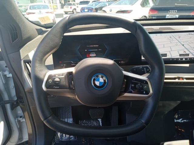 used 2025 BMW iX car, priced at $70,888