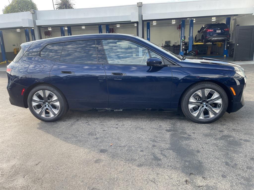 new 2026 BMW iX car, priced at $98,895