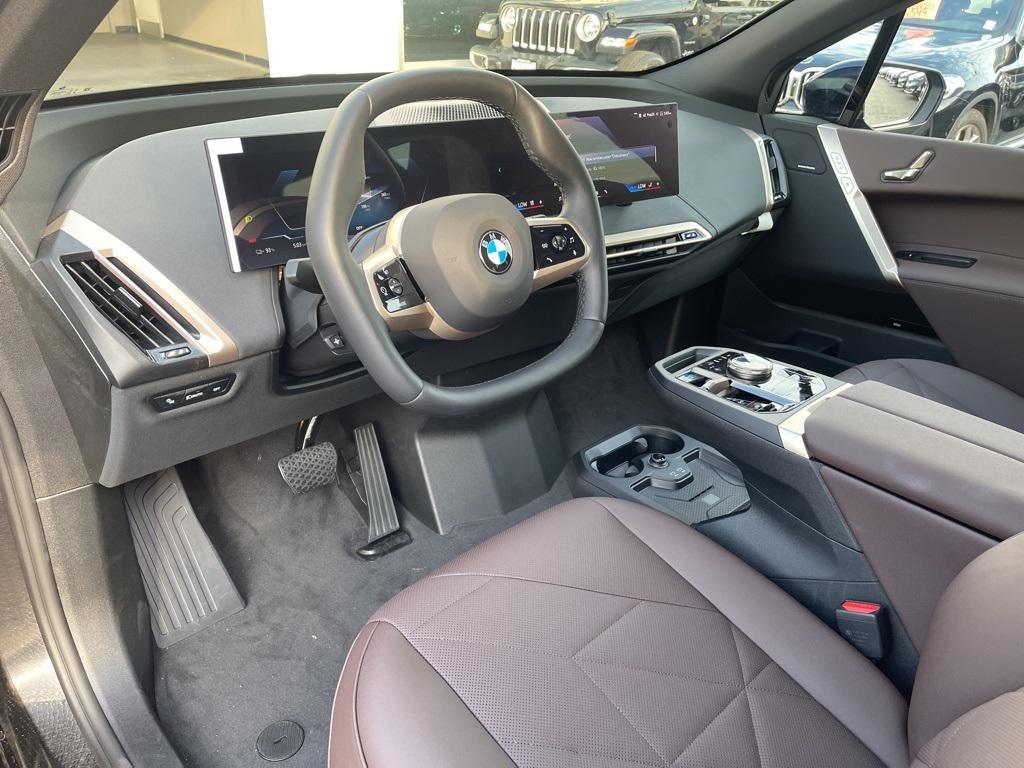 new 2026 BMW iX car, priced at $98,895