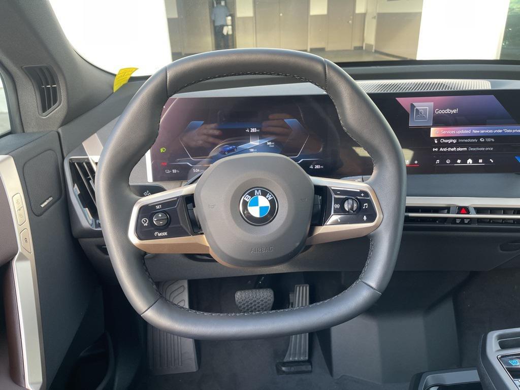 new 2026 BMW iX car, priced at $98,895