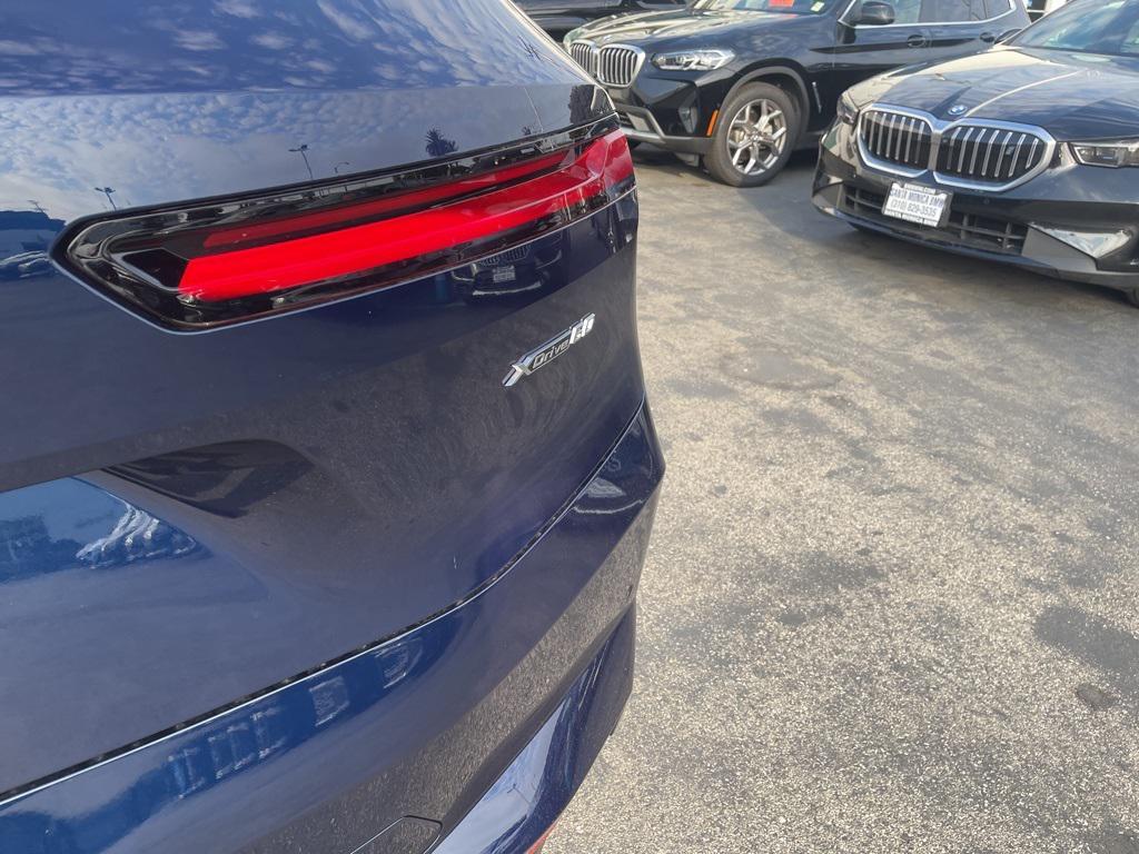 new 2026 BMW iX car, priced at $98,895