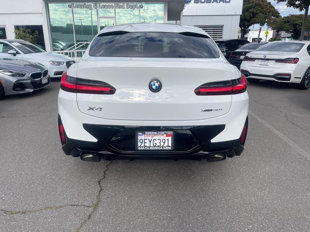 used 2023 BMW X4 car, priced at $35,997