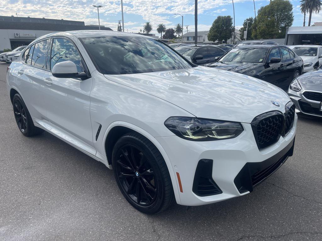 used 2023 BMW X4 car, priced at $35,997