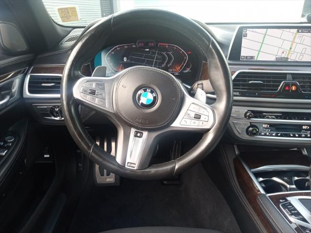 used 2022 BMW 750 car, priced at $59,977