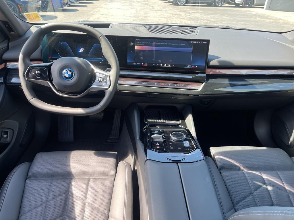 used 2024 BMW i5 car, priced at $44,997