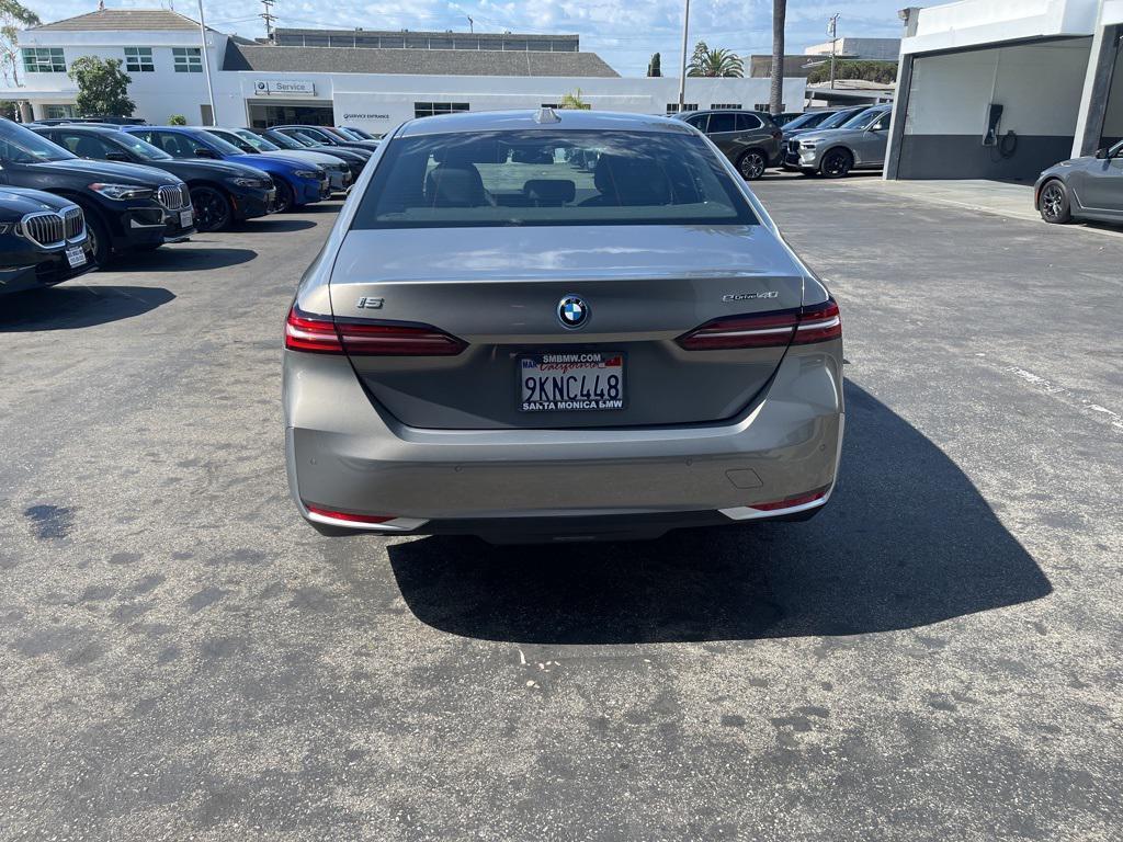 used 2024 BMW i5 car, priced at $44,997