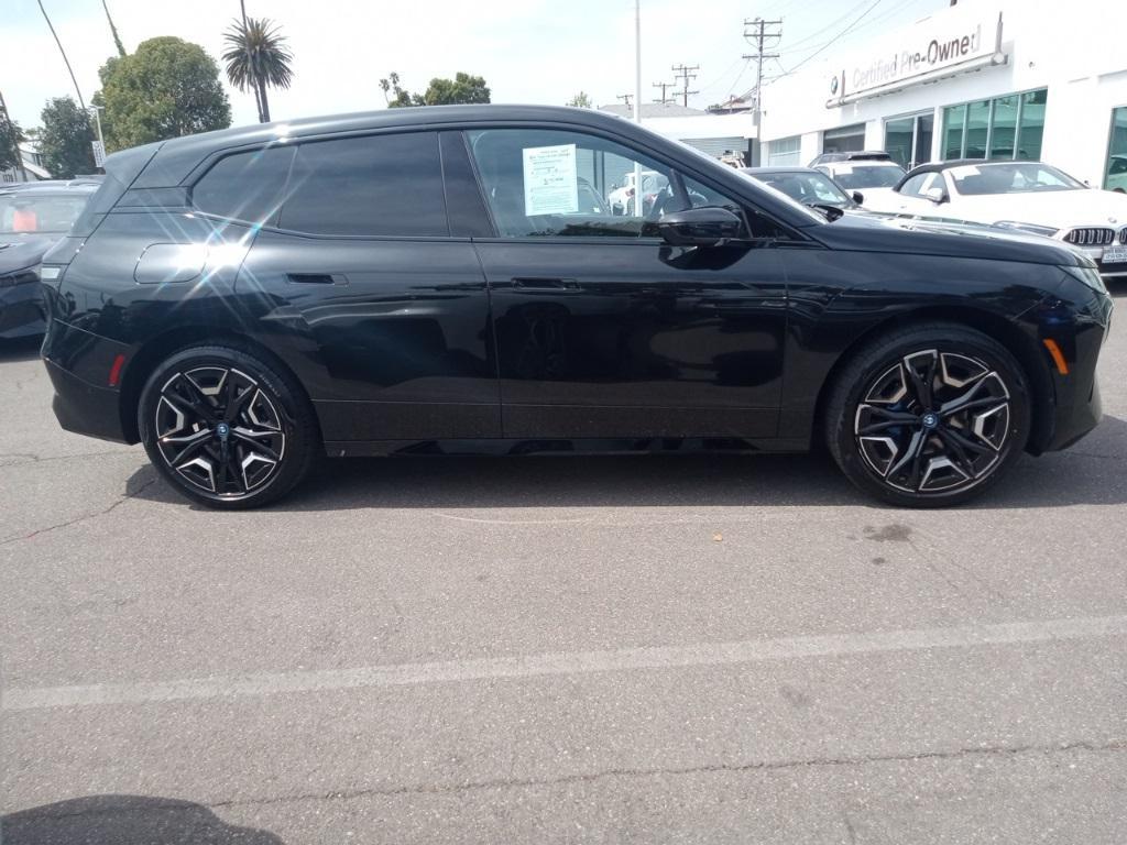 used 2024 BMW iX car, priced at $59,977