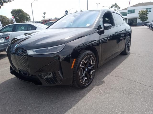 used 2024 BMW iX car, priced at $63,997