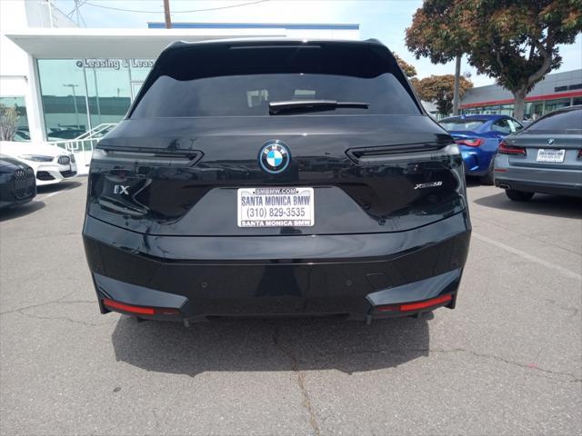used 2024 BMW iX car, priced at $63,997