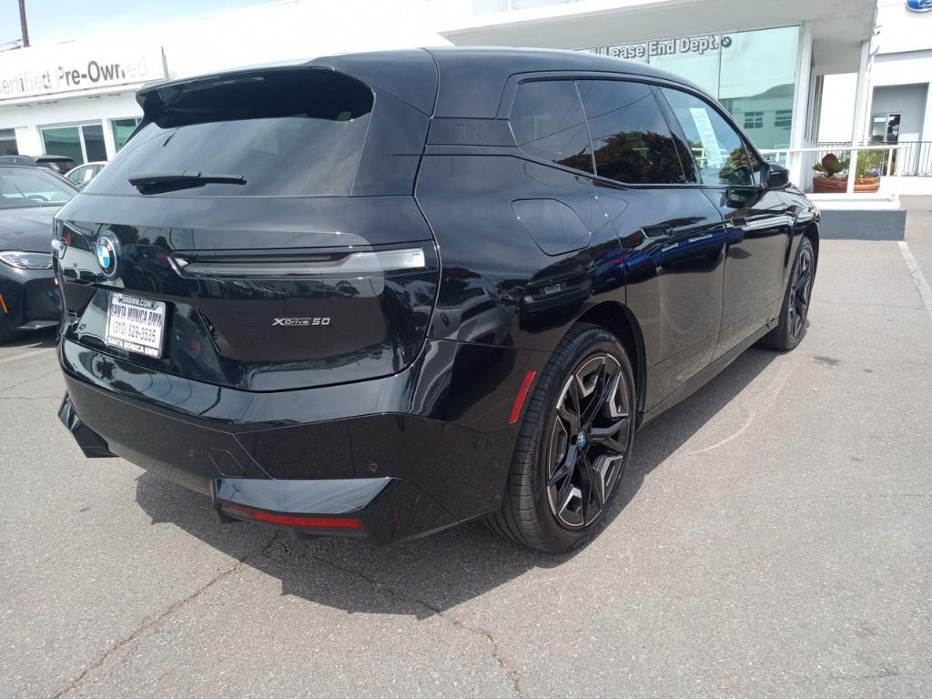 used 2024 BMW iX car, priced at $59,977