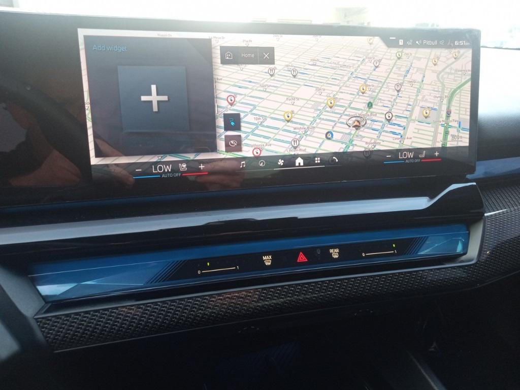 used 2024 BMW i5 car, priced at $57,888
