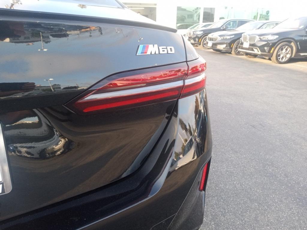 used 2024 BMW i5 car, priced at $57,888