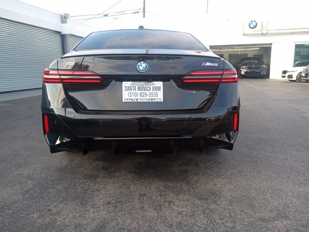 used 2024 BMW i5 car, priced at $57,888