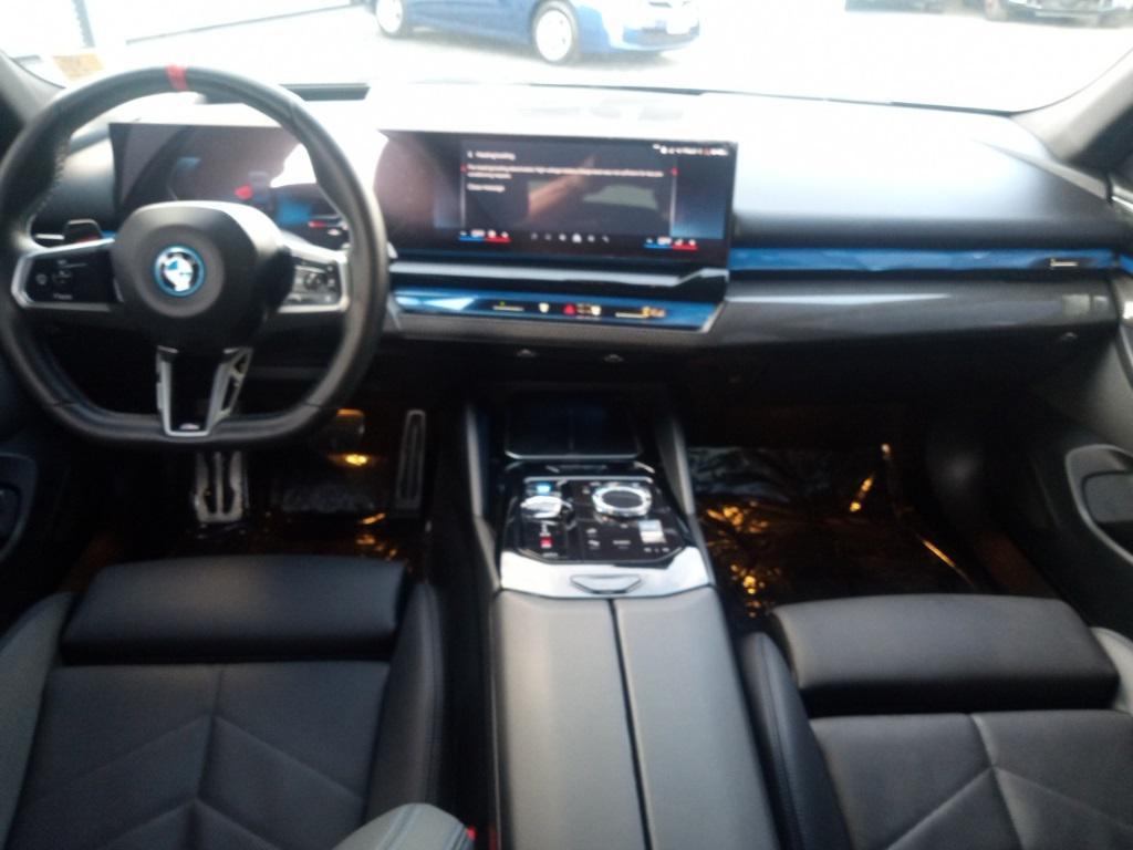 used 2024 BMW i5 car, priced at $57,888