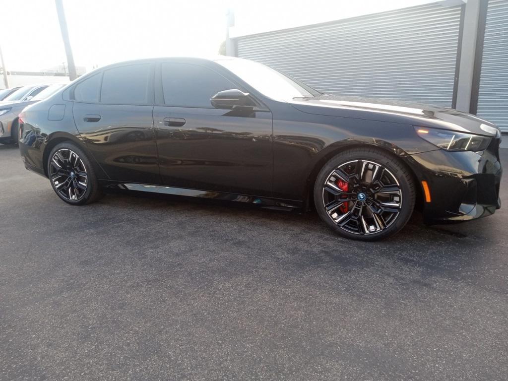 used 2024 BMW i5 car, priced at $57,888
