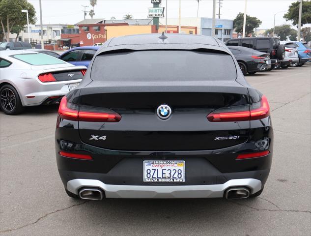 used 2022 BMW X4 car, priced at $36,997