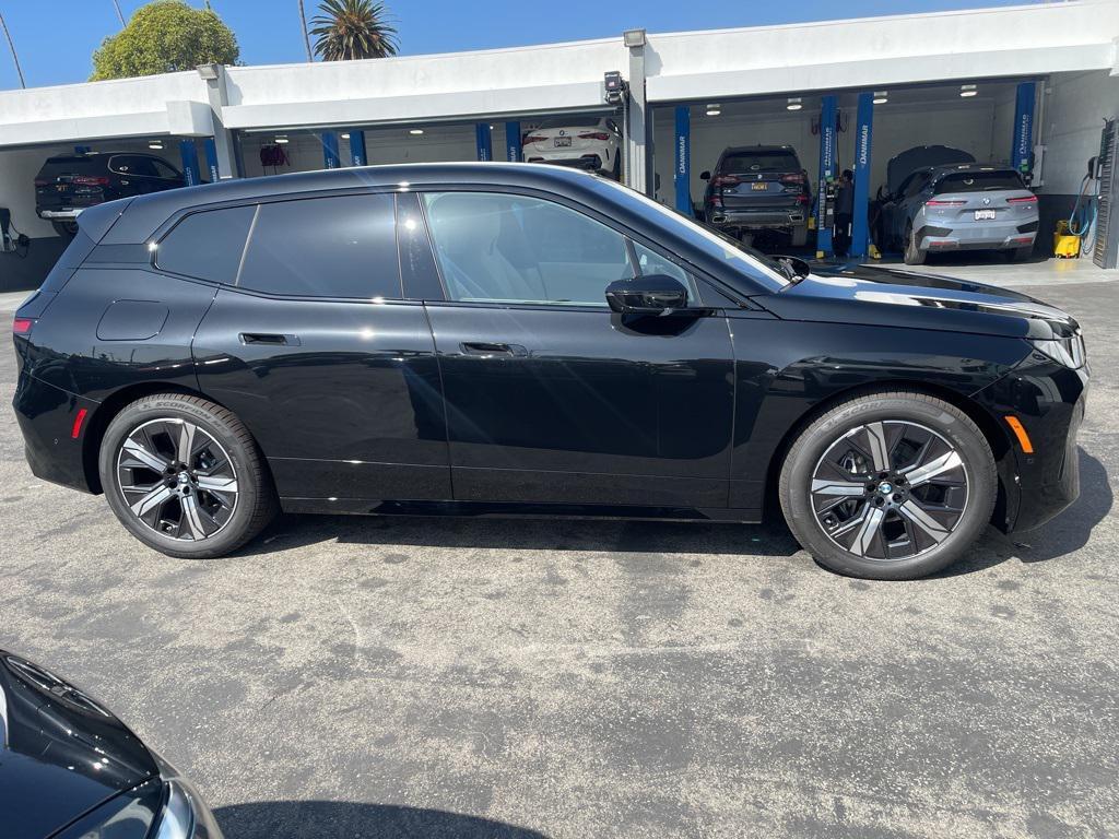 new 2026 BMW iX car, priced at $84,020