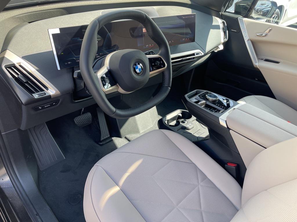 new 2026 BMW iX car, priced at $84,020
