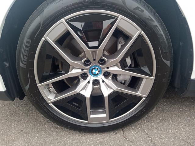 used 2024 BMW i5 car, priced at $48,977