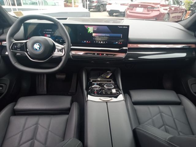 used 2024 BMW i5 car, priced at $48,977