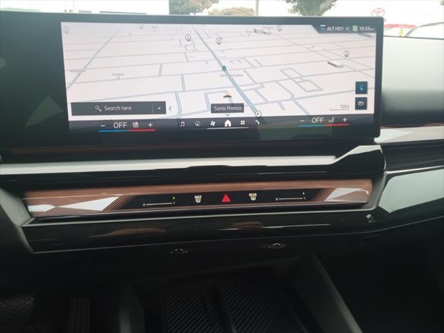 used 2024 BMW i5 car, priced at $48,977