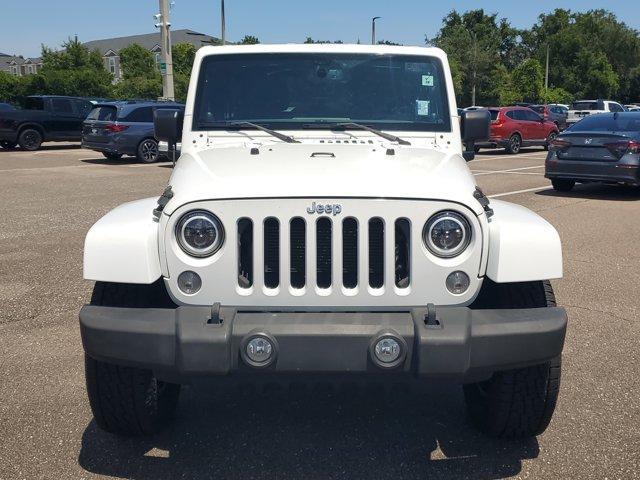 used 2014 Jeep Wrangler Unlimited car, priced at $18,877