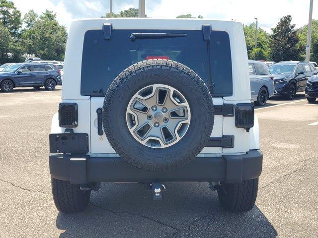 used 2014 Jeep Wrangler Unlimited car, priced at $18,877