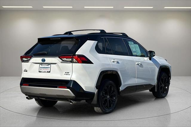 used 2023 Toyota RAV4 Hybrid car, priced at $33,990