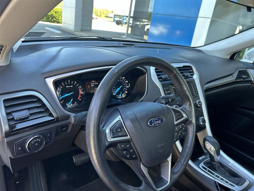 used 2014 Ford Fusion car, priced at $9,000