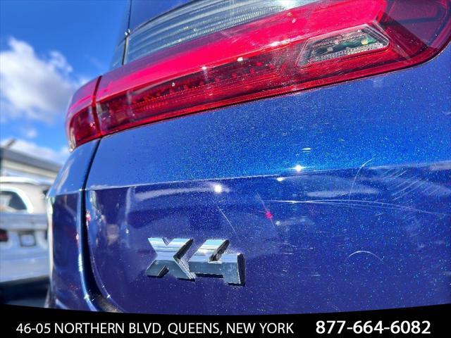 used 2023 BMW X4 car, priced at $52,500