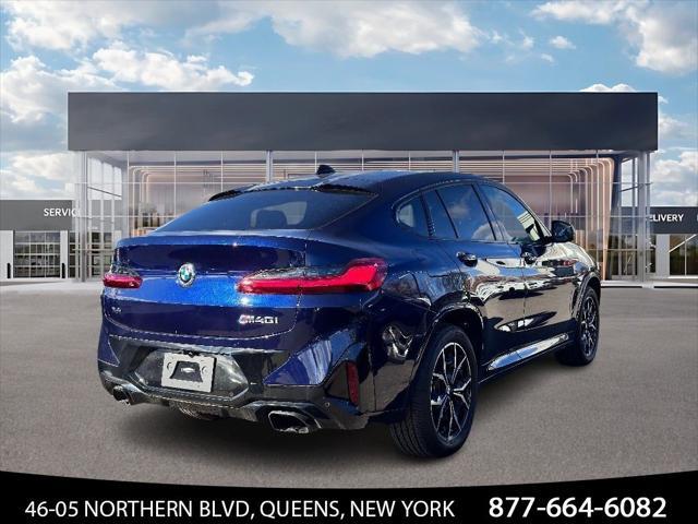 used 2023 BMW X4 car, priced at $52,500