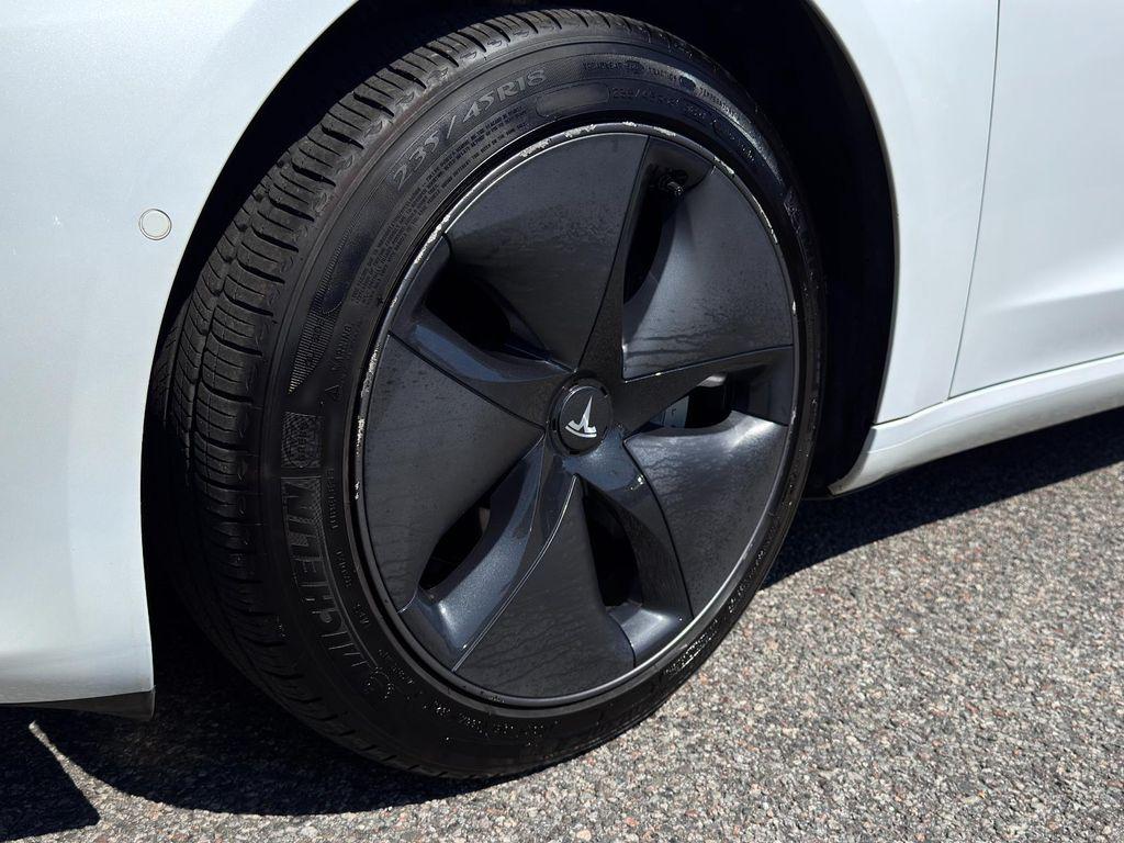 used 2018 Tesla Model 3 car, priced at $20,695