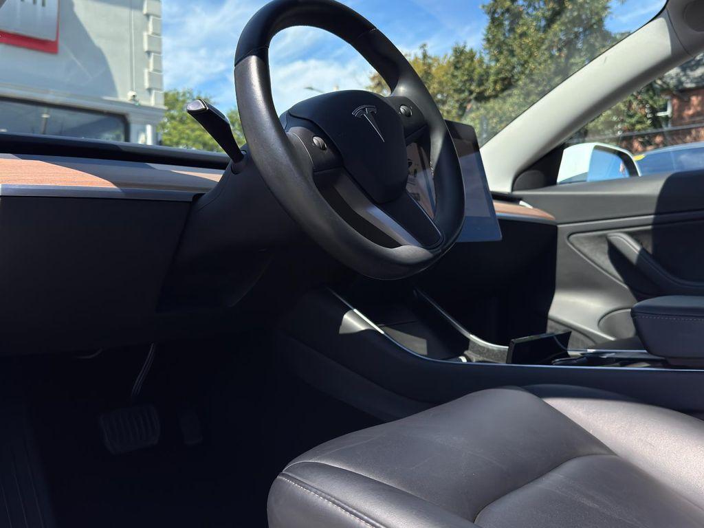 used 2018 Tesla Model 3 car, priced at $20,695