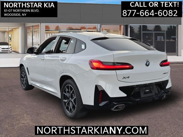 used 2022 BMW X4 car, priced at $43,995