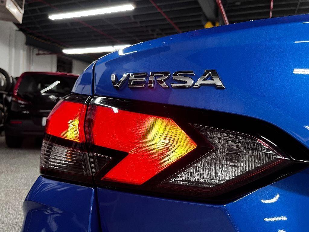 used 2021 Nissan Versa car, priced at $10,000