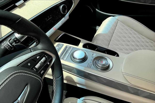 used 2025 Genesis GV70 car, priced at $57,424