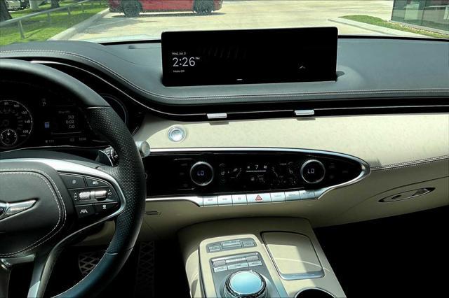 used 2025 Genesis GV70 car, priced at $57,424