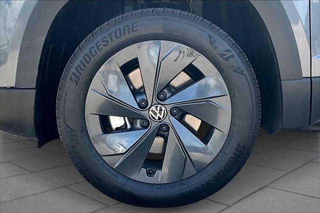 used 2025 Volkswagen Taos car, priced at $23,859