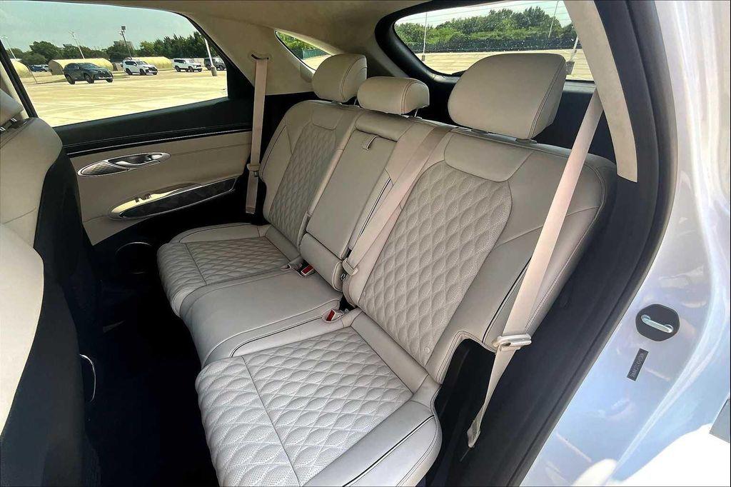 used 2025 Genesis GV70 car, priced at $57,859