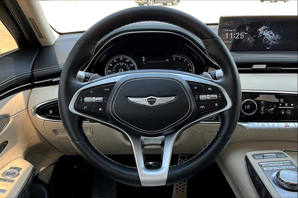used 2025 Genesis GV70 car, priced at $57,859
