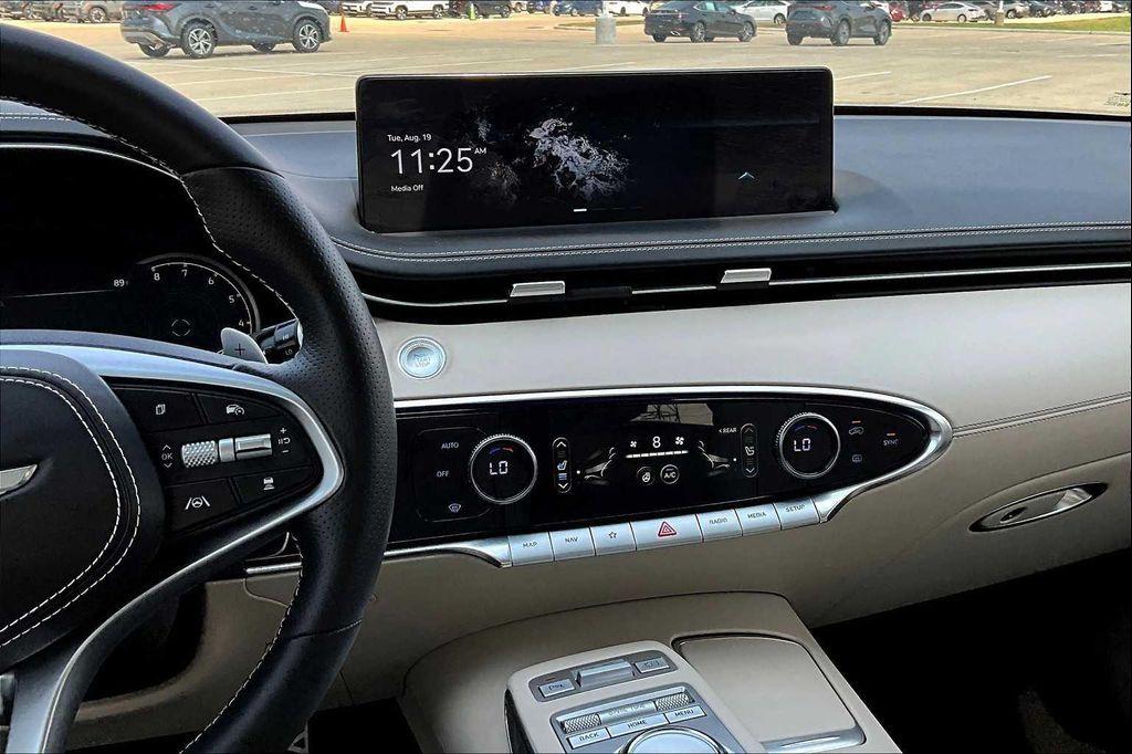 used 2025 Genesis GV70 car, priced at $57,859
