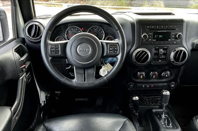 used 2015 Jeep Wrangler Unlimited car, priced at $20,507