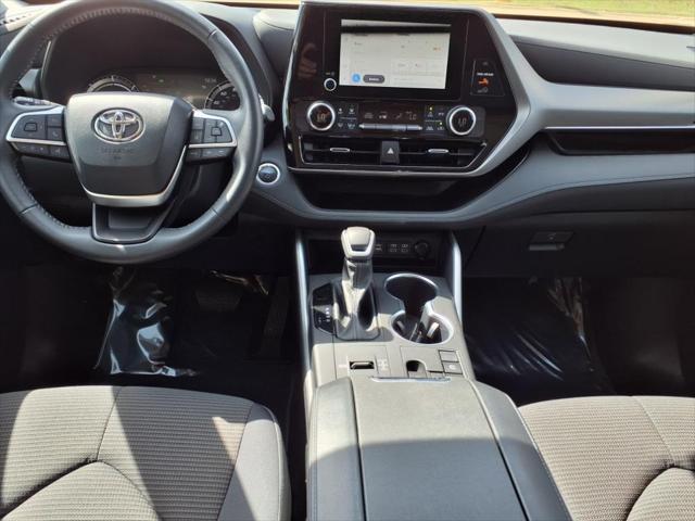 used 2024 Toyota Highlander Hybrid car, priced at $40,988