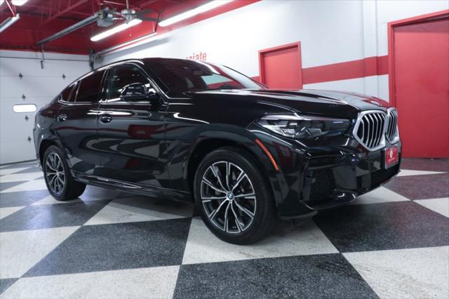 used 2023 BMW X6 car, priced at $58,990