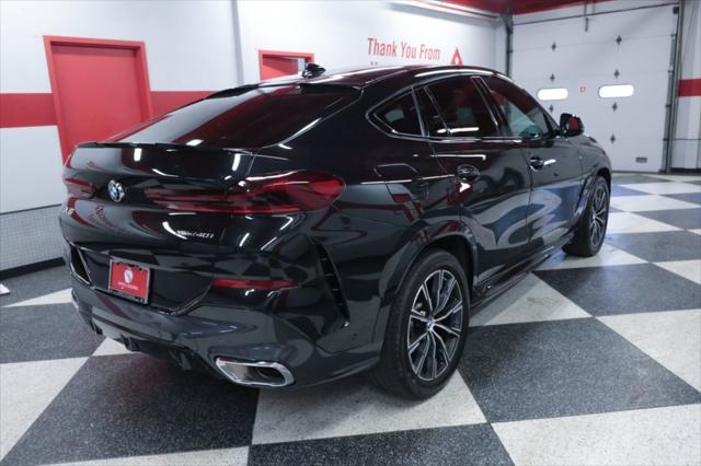 used 2023 BMW X6 car, priced at $58,990