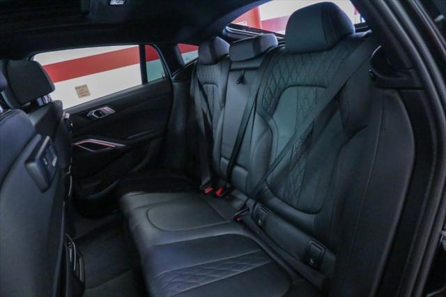 used 2023 BMW X6 car, priced at $58,990